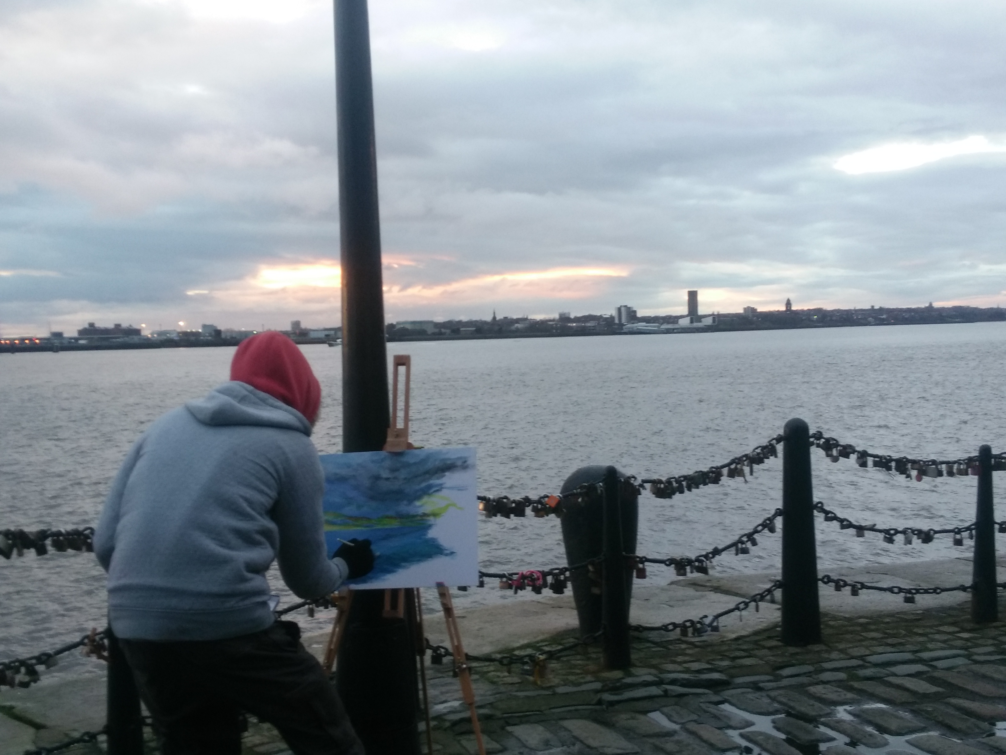 Painter at waterfront